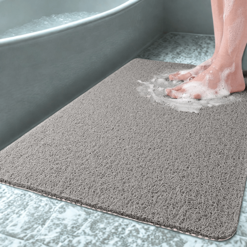 Non-slip shower mat with hygienic drainage system